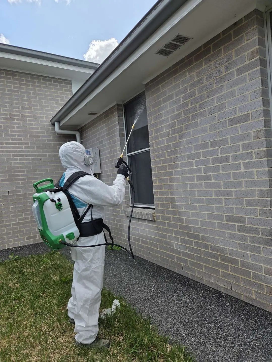 Treating the eaves and window frames of a brick home
